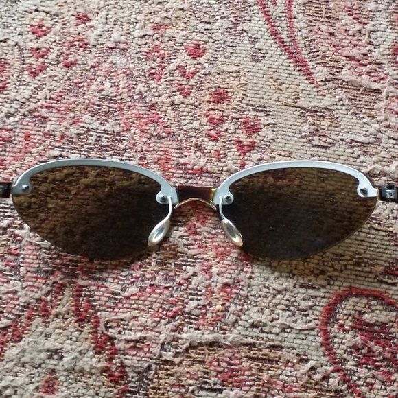 PRADA Sunglasses Model:PRADA SPR 10B Frame Color:Brushed Matte Silver Tortoise - Picture 11 of 13